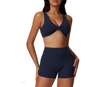 ชุดเล่นโยคะสีขาวสำหรับผู้หญิงชุดออกกำลังกายสองชิ้นเสื้อชั้นในพร้อมกางเกงขาสั้นไร้รอยต่อ - Product Image 1