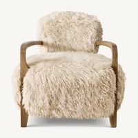 Fauteuil de loisirs Taddeus en tissu noir brossé tendance et structure en bois massif pour salon, hôtel, appartement