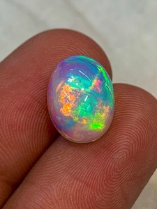 Vente en gros cabochon opale éthiopienne de qualité supérieure blanc naturel 11x9mm pierre précieuse ovale en vrac faite à la main - Product Image 4