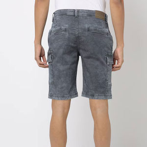 2025 pantalones cortos de mezclilla informales para hombres de secado rápido estilo único 100% algodón patrón sólido servicio OEM logotipo marca precio con descuento frontal - Product Image 3