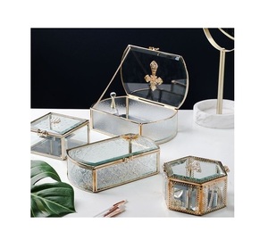 Premium handcrafted brass and <b>glass</b> <b>jewelry</b> <b>box</b> with delicate gold metalwork and elegant design for <b>jewelry</b> display - Product Image 1