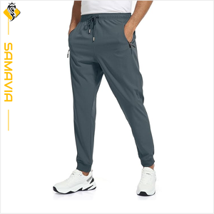 OEM Personnalisé Tricoté Poche Pantalons pour Hommes Respirant Anti Boulochage Coupe-Vent Imperméable Taille Élastique Pantalons de Survêtement Pantalons RTS - Product Image 1