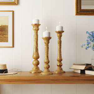 Bougeoir et porte-bougie à pilier au design accrocheur et finition dorée pour la décoration de la maison - Product Image 1