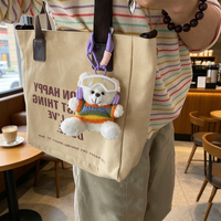 Peluches d'hiver en gros : ours en peluche avec lunettes de ski, pulls à motif cœur, écouteurs, mini-ours en peluche porte-clés