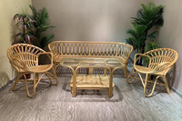 Ensemble de canapé avec table basse en rotin naturel coussin en coton beige clair intérieur extérieur style bohème jardin patio balcon