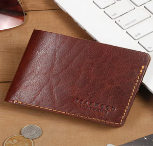 Compact and elegant black leather <b>wallet</b> with a small <b>coin</b> pouch and multiple card compartments, available at wholesale prices. - Product Image 6