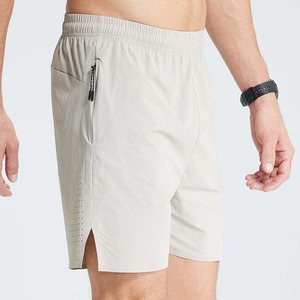 Pantalones cortos de gimnasio de algodón antiencogimiento con logotipo personalizado OEM, pantalones cortos de playa ajustados con bolsillos laterales grises para hombre - Product Image 4