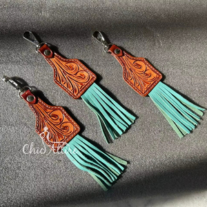 Nouveau véritable fabriqué à la main couleur véritable cuir repoussé mignon charmant gland porte-clés Offre Spéciale Style occidental moderne Floral porte-clés - Product Image 1