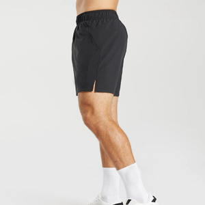 Pantalones cortos de gimnasio elásticos impermeables negros para hombre, venta al por mayor, estampado liso, cintura elástica, ropa deportiva, patrón sólido, tarifas baratas - Product Image 3
