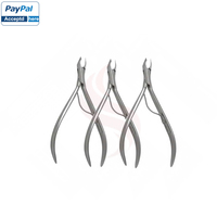 Pince à cuticules en acier inoxydable tendance brosse à ongles à ressort unique pour salon de manucure fournie dans un joint de boîte ronde