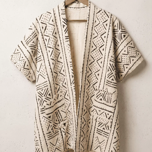 Robe brodée artisanale en lin et coton pour femme, silhouette féminine avec ourlet à volants, respirante pour une soirée romantique - Product Image 1