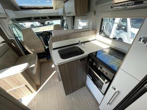 Autocaravana Ford Transit Gris, Vehículo Convertible para Pasajeros y Carga, Ideal para Viajes y Campamentos - Product Image 3