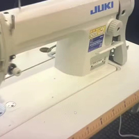 Machine à coudre industrielle à point droit à entraînement direct à aiguille simple JUKI DDL-8100E d'occasion