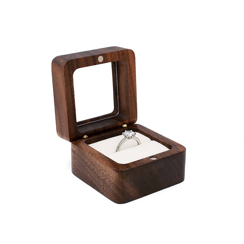White heart shaped transparent lid ring box