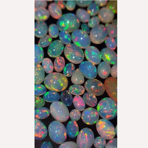 237ชิ้นโอปอลเอธิโอเปียธรรมชาติที่มีไฟ6x4 7x5 8x6 9x7 10x8มม. รูปไข่ลูกแพร์ Cabochon 174 CTS มาก iroc ขายพลอย CAB เรา $296 - Product Image 2