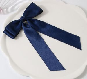 คลิปหนีบผมโบว์ริบบิ้นผ้าโพลีเอสเตอร์สีทึบกิ๊บสําหรับผู้หญิงสาวผมโบว์ - Product Image 6