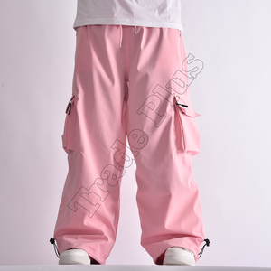 Pantalones de nieve impermeables rosa claro de gran tamaño con forro polar cálido bolsillos de carga laterales hasta la rodilla cremalleras de ventilación y polainas para botas - Product Image 2