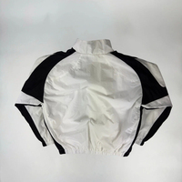 Chaqueta y pantalones de chándal de nailon a prueba de viento impermeables reflectantes de gran tamaño con cremallera de poliéster personalizados Conjunto unisex de chándal de nailon