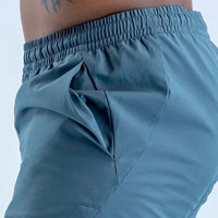 Shorts d'entraînement pour hommes en polyester gris ardoise, sans couture, avec logo personnalisé OEM en gros, taille élastique pour l'entraînement en salle de sport