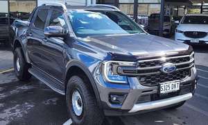 รถกระบะมือสอง Ford Ranger Wildtrak ปี 2024 เครื่องยนต์ 2.0 Bi-Turbo ขับเคลื่อน 4 ล้อ เกียร์ออโต้ แบบดับเบิ้ลแค็บ สีขาว ไฟหน้า LED ยาง R17 พร้อมแร็คหลังคาโลหะ ขาย - Product Image 2