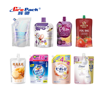 GREPACK Machine de remplissage et de capsulage rotative automatique Machine de remplissage de jus en forme de fruit avec bec verseur
