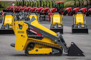 Minicargadora Wacker Neuson SM100 con orugas amarillas, minicargadora compacta para manejo de materiales - Product Image 2