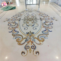 Carreaux de marbre à jet d'eau de fleurs Motif de sol design Matériaux de construction Conception de médailles Carreaux de sol à jet d'eau incrustés de marbre
