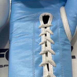 ถุงมือชกมวยแบบมีเชือกผูก OEM ODM สีฟ้าขาว ออกแบบได้ตามต้องการ คุณภาพระดับมืออาชีพ สวมใส่สบาย หนังแท้คุณภาพสูง ระบายความชื้นได้ดี - Product Image 6