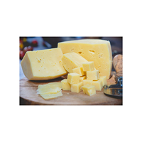 Beurre de fromage stérilisé riche, lisse et fruité, boîte de 25 kg, 82 % de matières grasses, durée de conservation de 18 mois, haute qualité, OEM/ODM