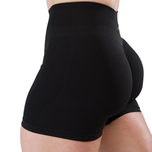 กางเกงขาสั้นออกกำลังกายผู้หญิง สีดำ ไร้ตะเข็บ เอวกลาง ยืดหยุ่น กระชับ ป้องกันการโป๊ เหมาะสำหรับการฝึกซ้อมและฟิตเนส - Product Image 4