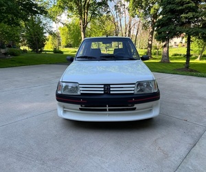 PEUGEOT 205 GTI 1990 D'OCCASION CÔTÉ GAUCHE/DROIT - Product Image 1