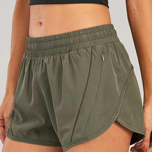 Shorts de yoga taille haute sans coutures pour femmes, couleur unie, avec poches, extensibles dans quatre directions et respirants, vente en gros - Product Image 5