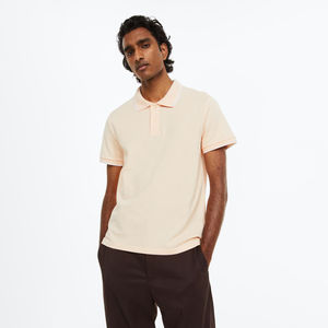 Polo de manga corta con logotipo personalizado para hombre recién llegado al por mayor de algodón con estampado sólido de primera calidad - Product Image 1