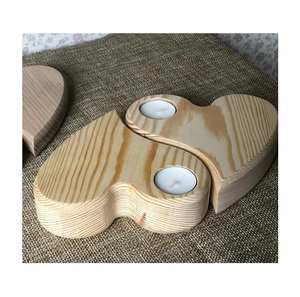 Portavelas de madera artesanal que ofrece un brillo cálido y una textura de grano natural para realzar la decoración del hogar. - Product Image 6