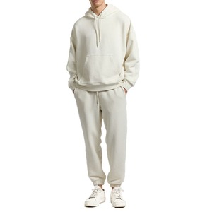 Conjunto de pantalones de chándal y sudaderas con capucha para hombre, chándal en blanco de algodón 100% de alta calidad, ropa de calle de gran tamaño, conjunto de pantalones de chándal con capucha personalizados - Product Image 1