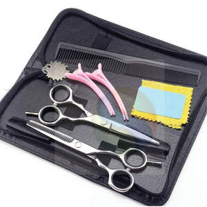 ชุดกรรไกรตัดผมมืออาชีพ น้ำหนักเบา สีดำและน้ำเงิน รุ่นพรีเมียม คมพิเศษ สำหรับร้านเสริมสวย - Product Image 1