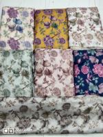 Nouveau tissu en soie Dola imprimé mis à jour pour les vêtements Salwar Kameez Matière première textile de qualité supérieure disponible pour l'exportation