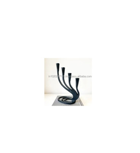 Black polished metal candelabra <b>for</b> <b>home</b> decor centerpiece and romantic dinner candlelight with classic design appeal - Product Image 1