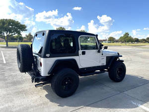 รถจี๊ปแรงเลอร์สปอร์ตปี 2002 พวงมาลัยซ้าย มือสองสภาพดี - Product Image 4