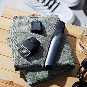 Recortadora de Vello Corporal Eléctrica Inalámbrica Unisex para Uso en Seco y Húmedo con Cuchillas de Acero Inoxidable, Potencia de 5W, 2000g, 2 Accesorios de Peine de Cerámica - Product Image 1