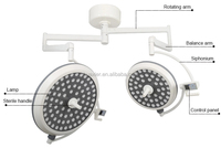 Lampe de modèle chirurgicale à double dôme électrique à LED sans ombre pour un fonctionnement optimal.