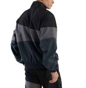 Ensemble coupe-vent OEM, logo brodé réfléchissant personnalisé en usine, veste légère en nylon zippée, survêtement 100% nylon pour hommes - Product Image 4