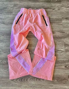 Pantalon de survêtement coupe-vent léger pour hommes avec taille élastique Logo personnalisé Bandes latérales en nylon et doublure en maille - Product Image 1