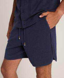 Pantalones cortos de tenis informales sólidos ecológicos de poliéster 100% de alta calidad OEM para hombres y mujeres con nombre y logotipo de equipo personalizados - Product Image 1