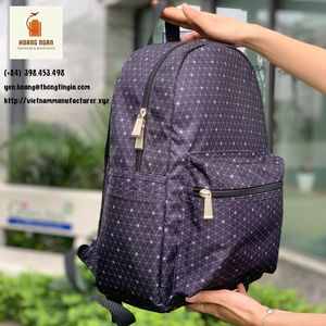 Mochila de poliéster con estampado de puntos, bolsas impermeables para estudiantes de Color blanco y negro para niños y niñas hechas de Vietnam - Product Image 3