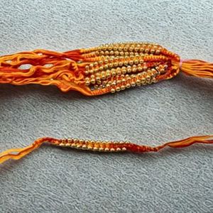 Fil de créateur fait à la main Rakhi Gold Moti Work Rakhi pour Raksha Bhandhan, Festivals Rakhis (lot de 12 ), Lot en vrac de Rakhi - Product Image 1