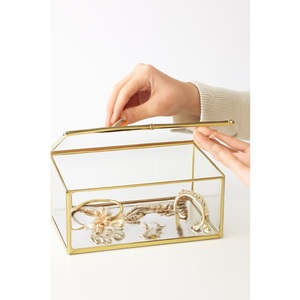 Joyero de cristal con marco dorado diseñado con precisión y ofrece una solución de almacenamiento de lujo para la colección de joyas de alta gama - Product Image 1