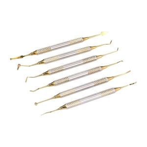 Juego de espátula de relleno de resina compuesta Dental de titanio-6 herramientas de restauración quirúrgica para instrumentos de precisión - Product Image 1