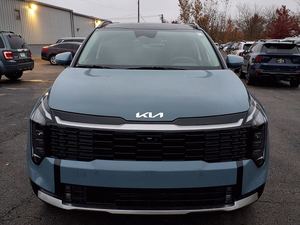 Kia Sportage hybride SX-Prestige AWD 2026 bleu éclatant, voiture d'occasion avec toit ouvrant, démarrage à distance, sièges en cuir, transmission automatique, jantes en alliage - Product Image 2