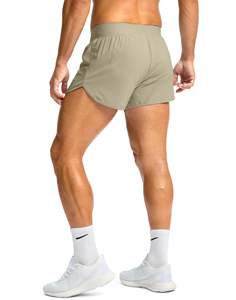 Ensemble de deux shorts d'entraînement en polyester à séchage rapide avec taille élastique et poches pour hommes, idéal pour la course à pied et les sports d'équipe. - Product Image 2